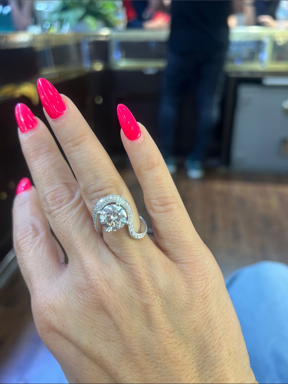 14kt white gold Swirl Halo engagement ring.